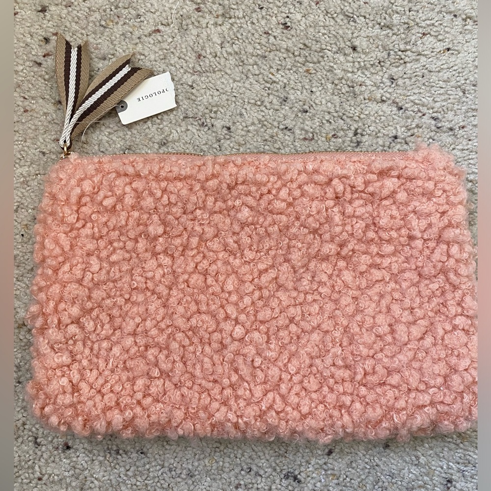 NWT!  Anthropologie clutch/makeup bag.  Pink curly faux fur trip.